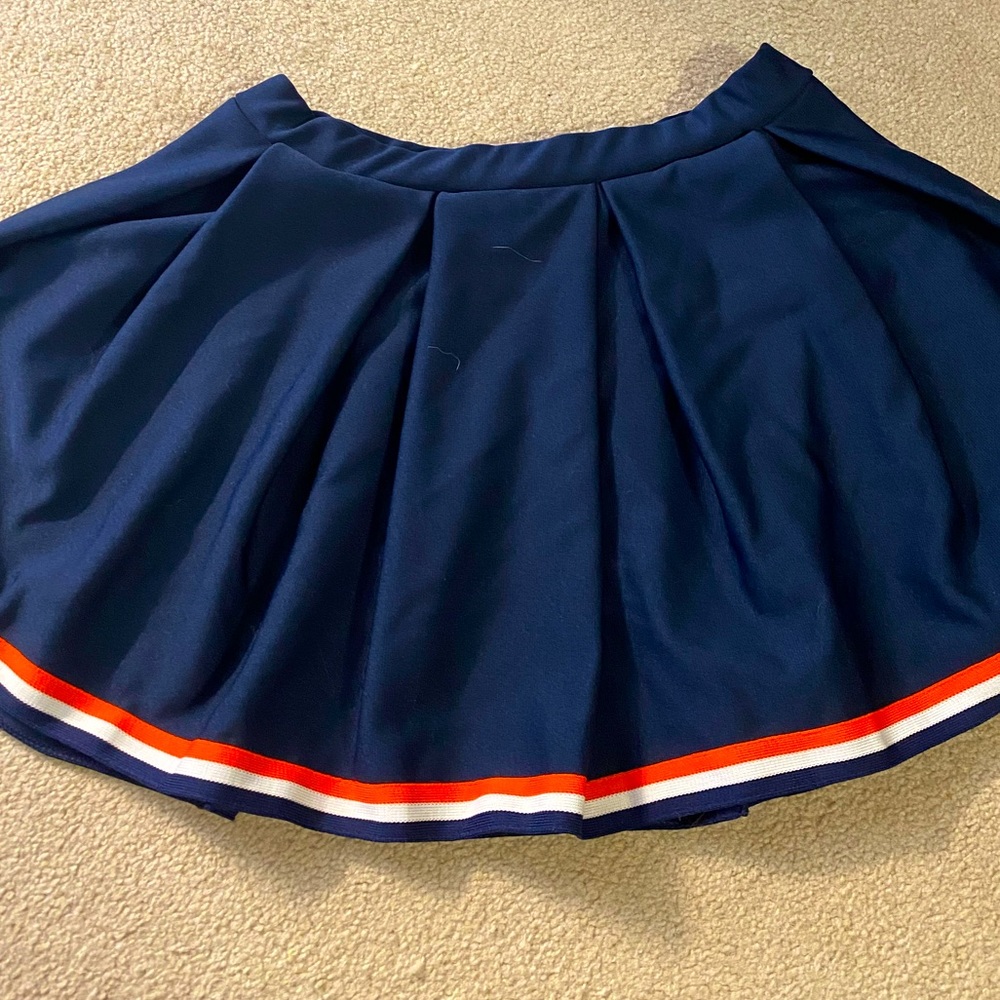 Cute Dark Blue skirt, with Orange and White Stripe.